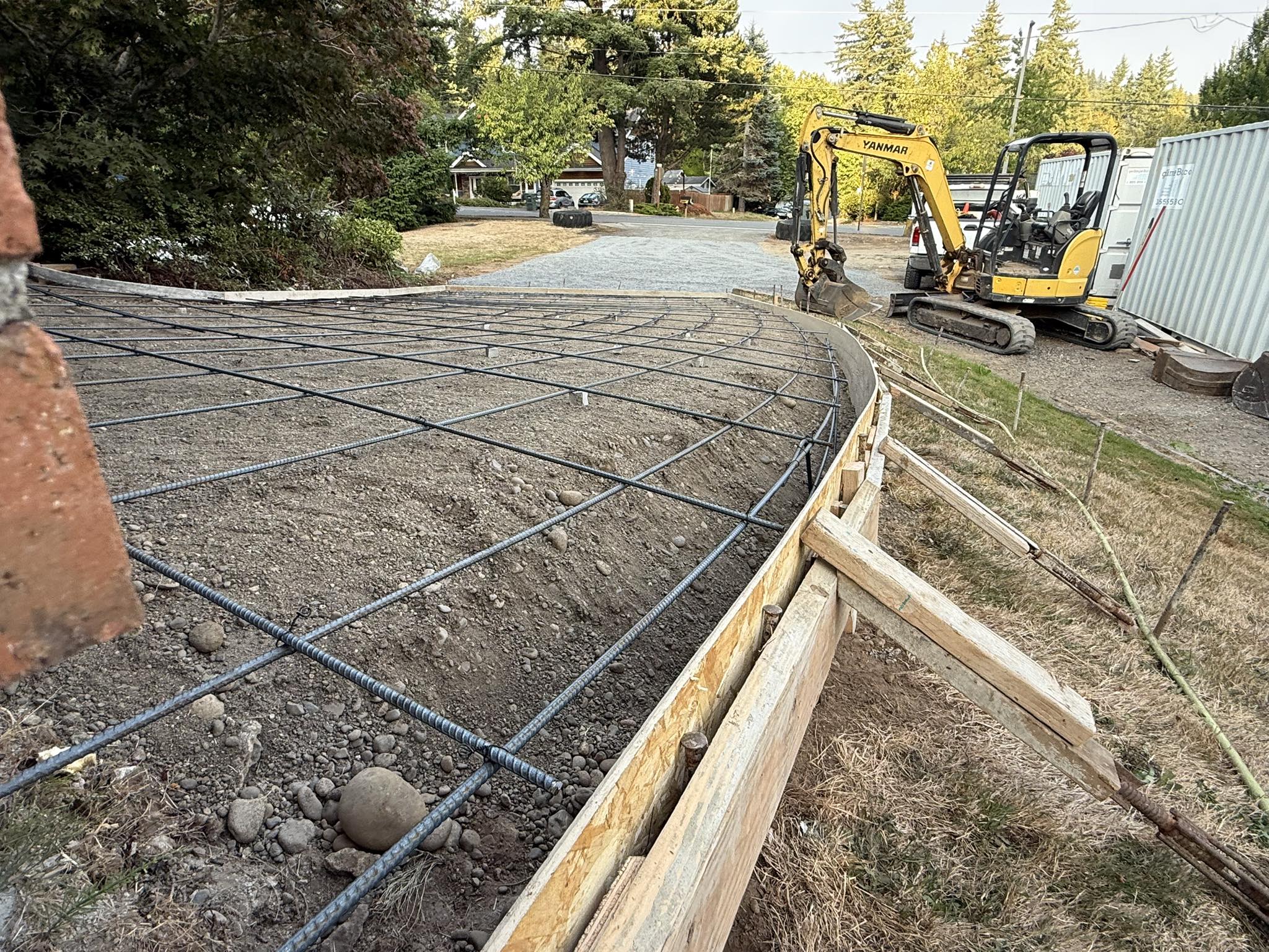 Wide concrete driveway installation